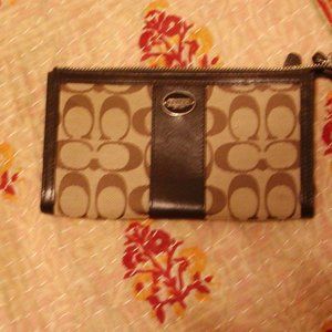 Coach, 7.5 X 4.5, leather clutch.